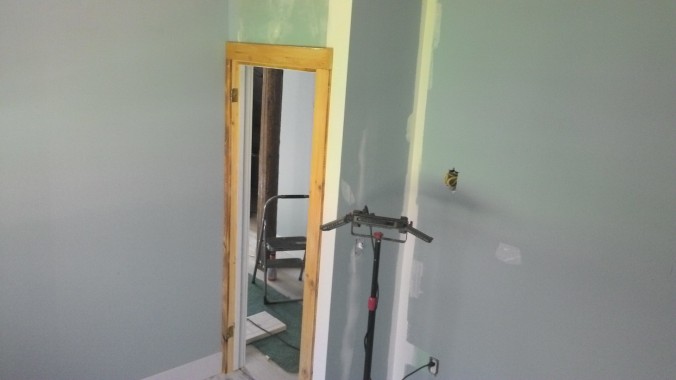 Guest bedroom doorway, all cased and ready for action.