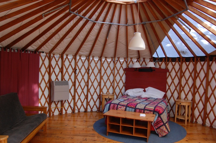 Inside a modern yurt, with a permanent floor and heating system. (Flickr - creative commons)